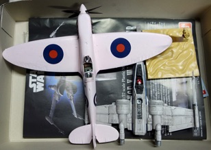 Modeler Marshall had a pink Spitfire and an almost completed X-wing.