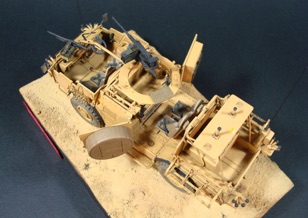 Ground work is Durhams water putty over pink foam.  Painted sand color and lots of pigments for dust effect.